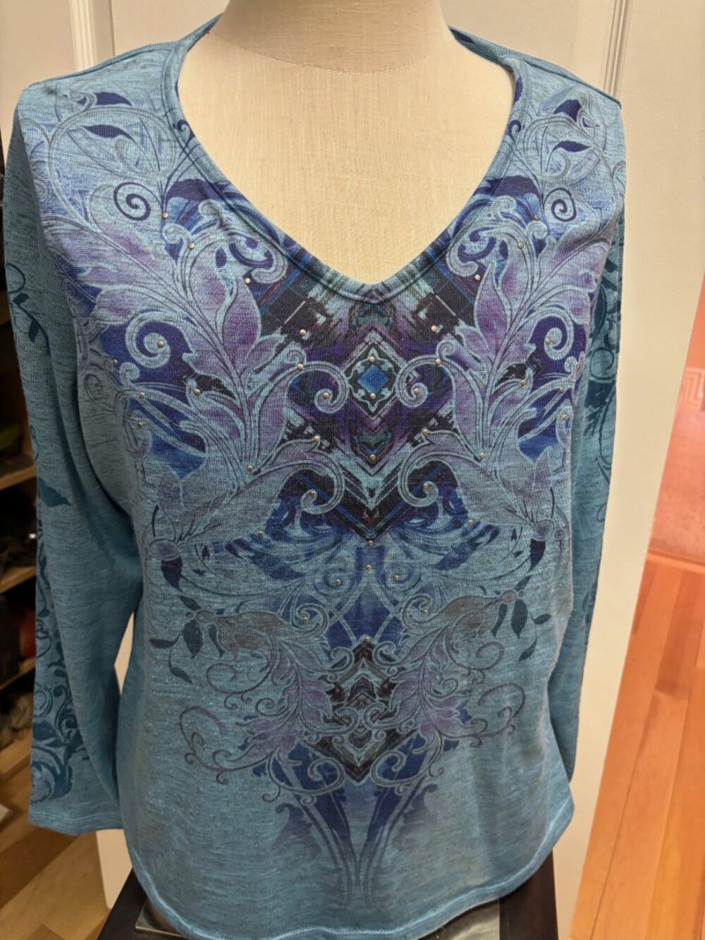 Long sleeve decorated, v-neck silver studded top